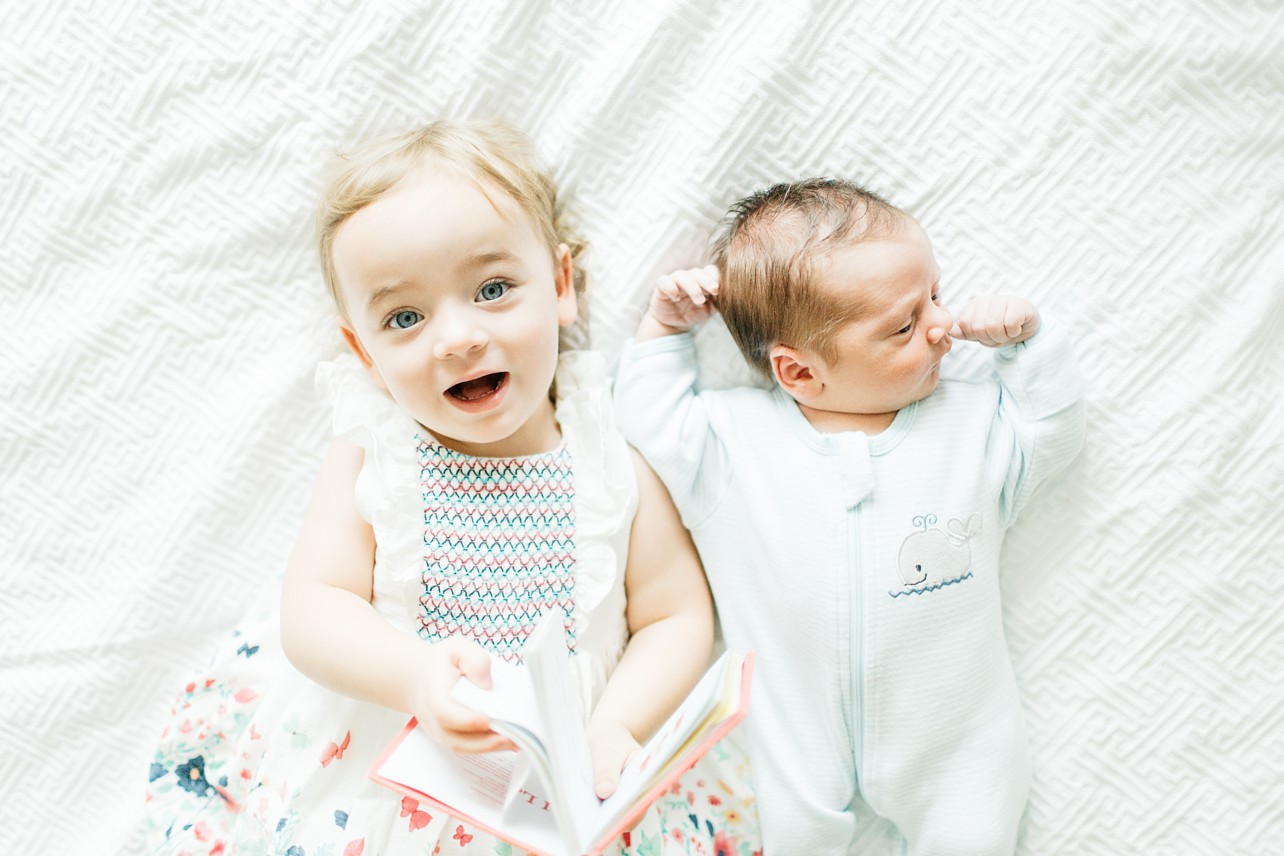 Newborn lifestyle session - a girl and her new baby brother