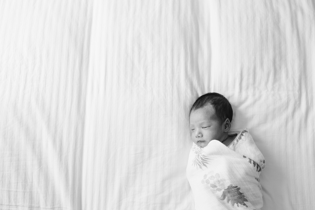 Newborn Session in Happy Valley with William - BW baby on the bed