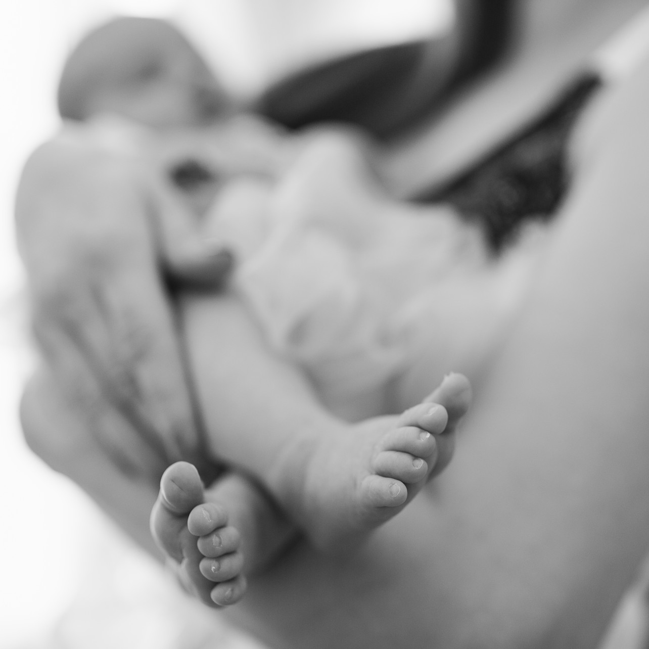 Tung Chung Newborn Session - in black and white - focused on the baby toes