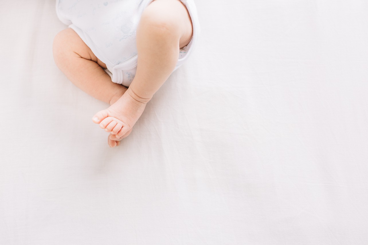 Relaxing Indoor Newborn In NT - baby's legs