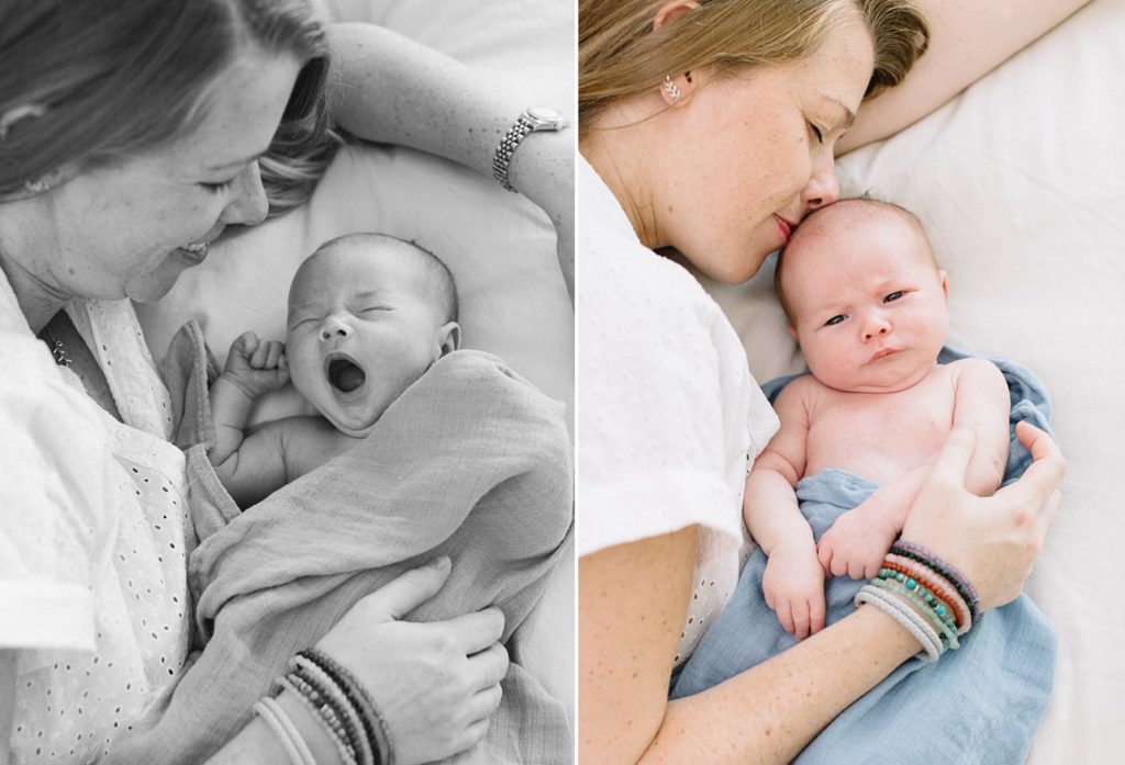 both pictures were shot from the above them, left image is black and white baby is sleepy and mom is smiling at him and right image is where mom is kissing the baby and baby is looking at the camera
