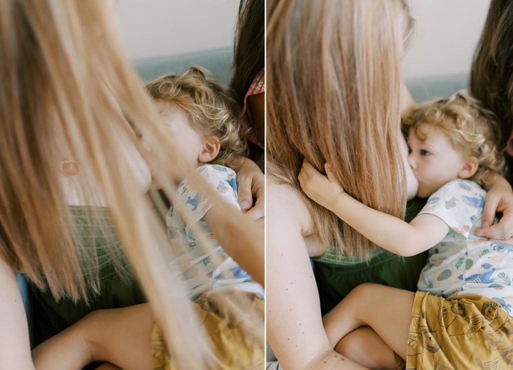 little boy is doing peekaboo with mother's hair while he is nursing himself