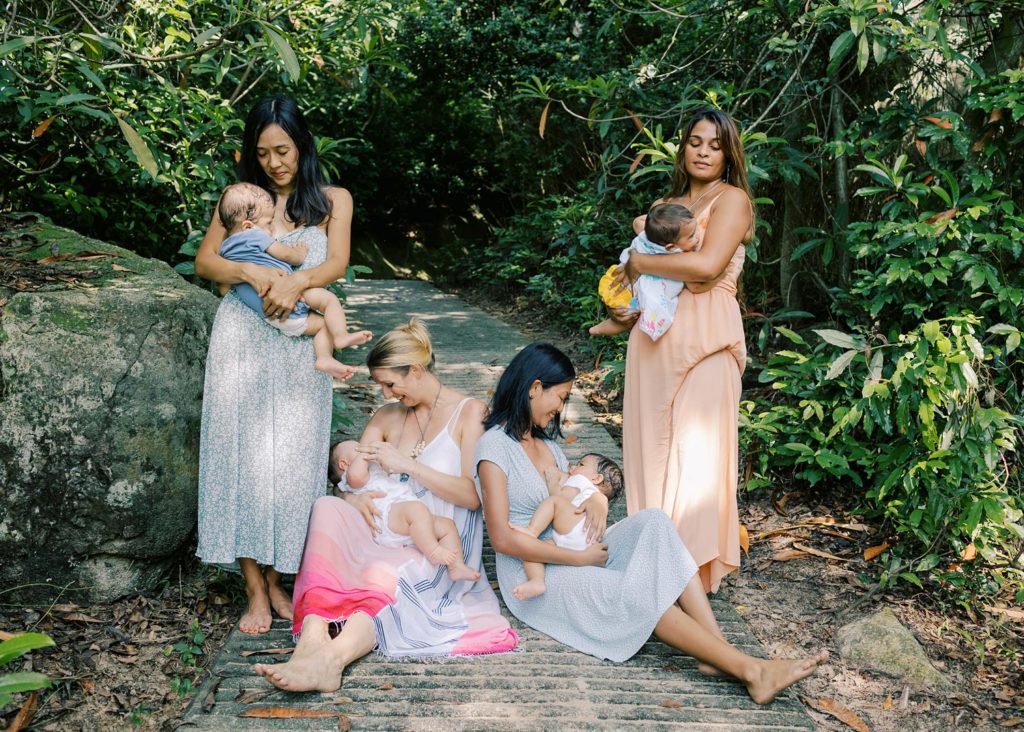 Nursing portrait of four mothers breastfeeding their baby at a forest trail near South Lantau beach. 